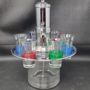 Vintage Circa 1950's Chrome & Glass Liquor Revolving Dispenser