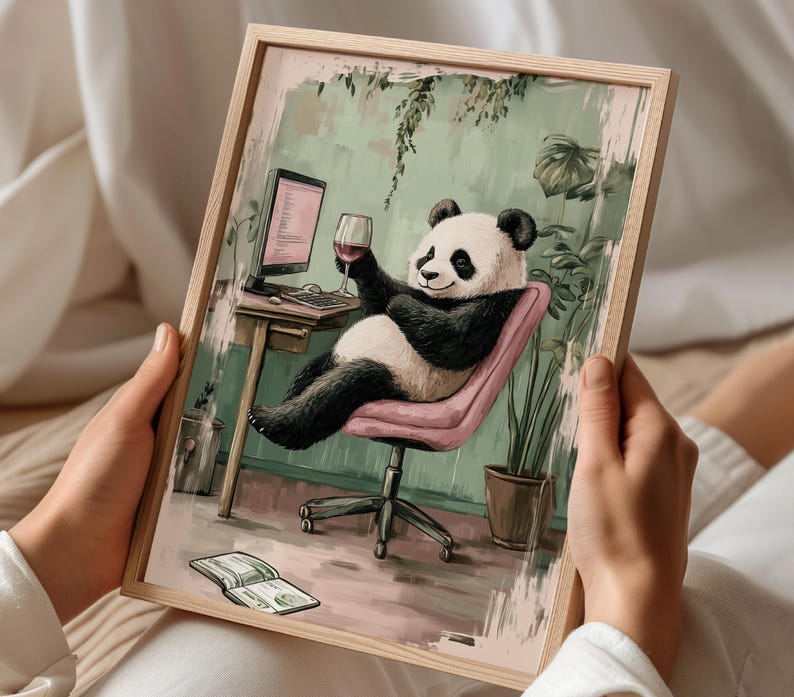 May include: A black and white panda bear sitting in a pink chair with a glass of red wine in its hand. The panda is wearing a relaxed expression and is looking at the viewer. The chair is in front of a desk with a computer and a keyboard. The background is a green wall with plants.