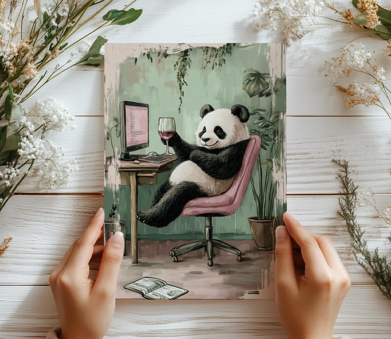 May include: A panda bear sitting at a desk with a glass of wine, a computer, and a notebook. The panda is wearing a pink chair and is surrounded by plants.