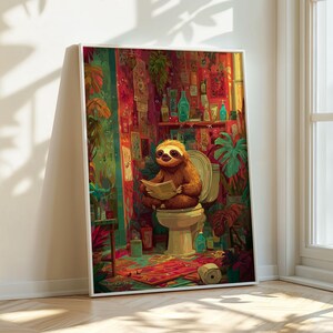 May include: A framed art print depicting a sloth reading on a toilet in a bathroom filled with plants. The artwork uses bright colours and has a playful theme. The image has a humorous touch.