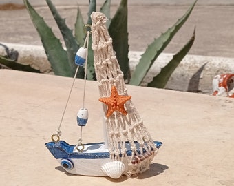 Handmade boat with sea ornaments home decor