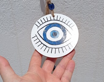 Evil eye on wood hanging decoration