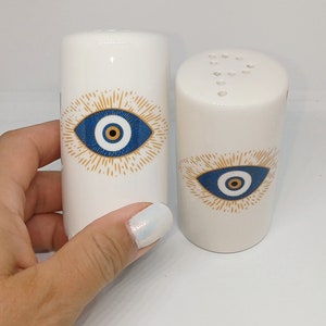 Gold evil eye salt and pepper ceramic skahers