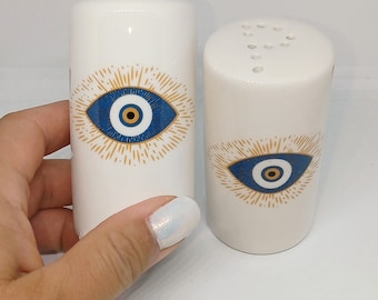 Gold evil eye salt and pepper ceramic skahers