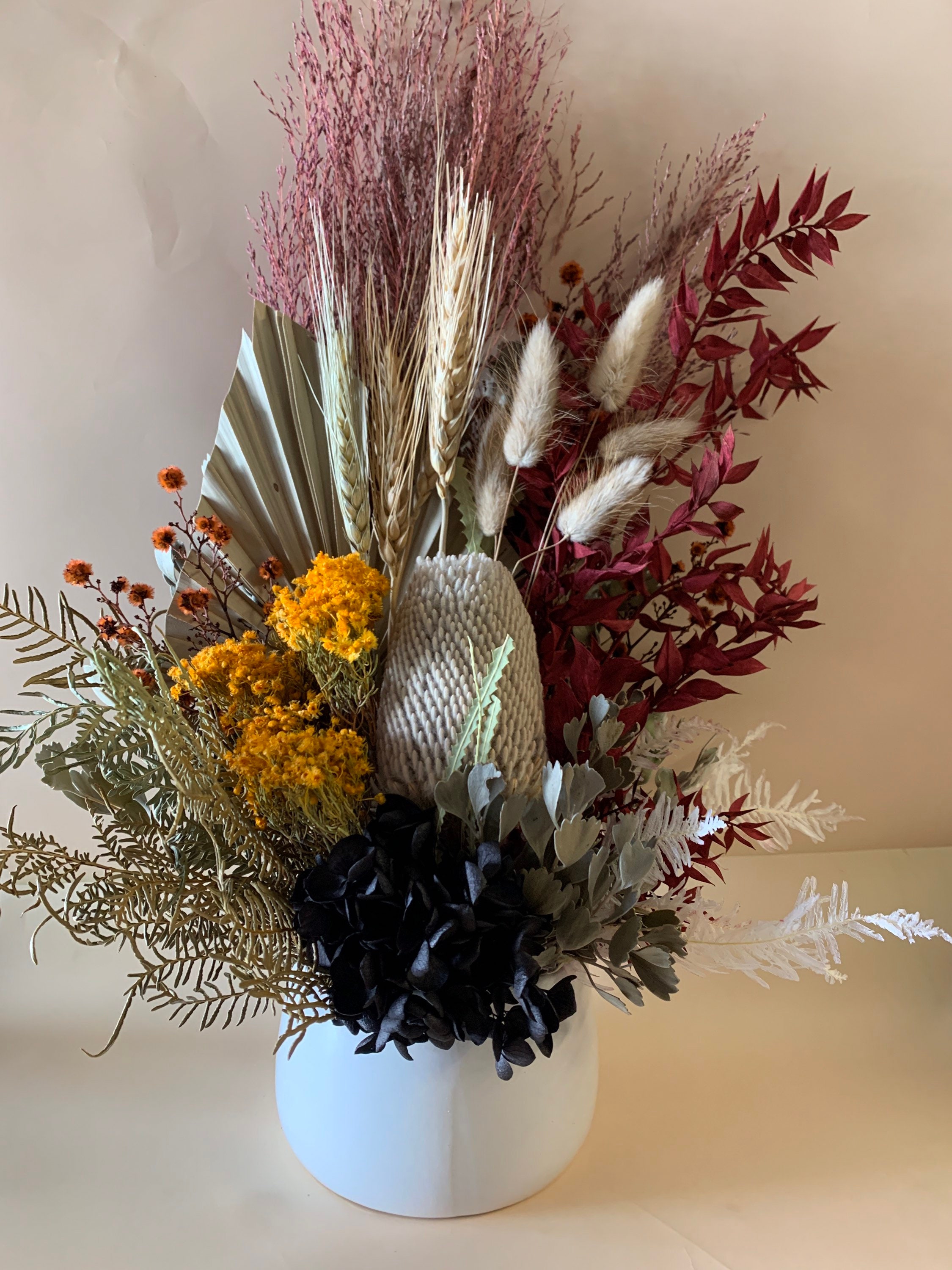 Dried flower arrangement in pot