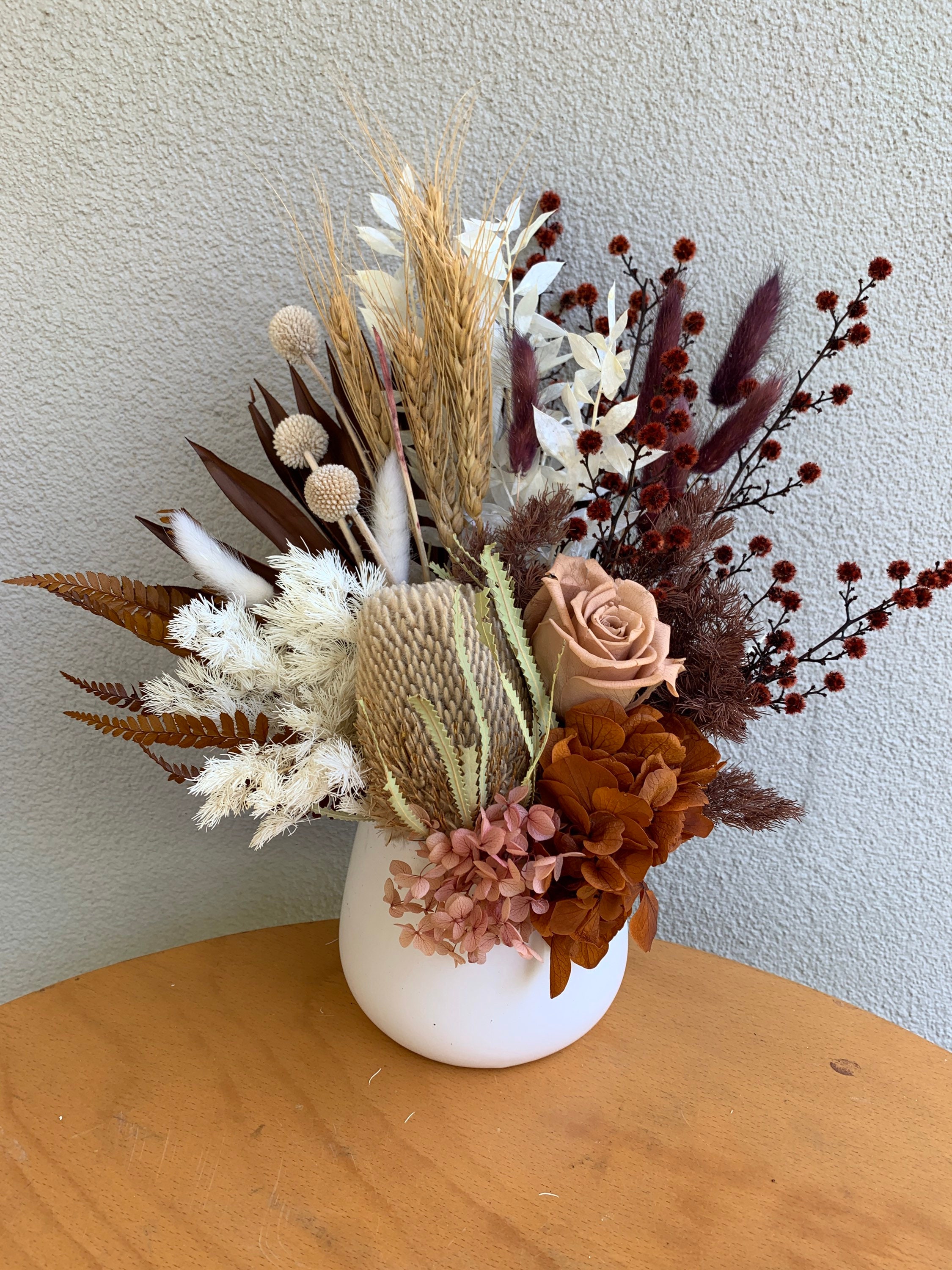 Preserved flower pot arrangement.