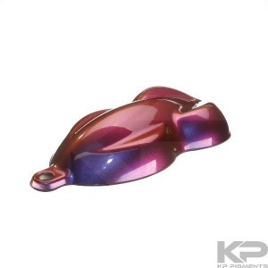 May include: A red and blue iridescent paint sample in a car body shape.