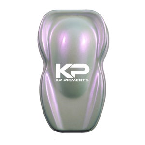 May include: A sample of iridescent paint in a pearlescent shade of purple and white. The paint is shown in a small, rounded container with the logo "KP Pigments" printed on the front.