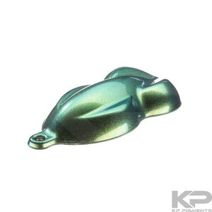 May include: A green and blue iridescent paint sample in a teardrop shape. The paint is a pearlescent finish with a metallic sheen.