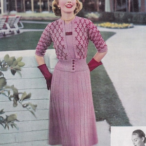 May include: A two-piece knit dress set in shades of pink and red. The cardigan features a diamond pattern and the skirt has a pleated design. Above, TWO-TONE CARDIGAN ENSEMBLE: No. 8316. Clover Mauve and Beauvais Monterey. Instructions on page 36.
