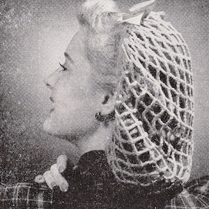 May include: A black and white photo of a woman wearing a hairnet. The hairnet is made of a fine mesh material and is covering the woman's hair. The woman's hair is styled in a bouffant.