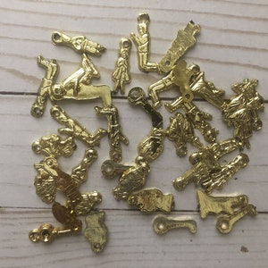 Set of Assorted 25 Plastic Gold Milagros ExVoto