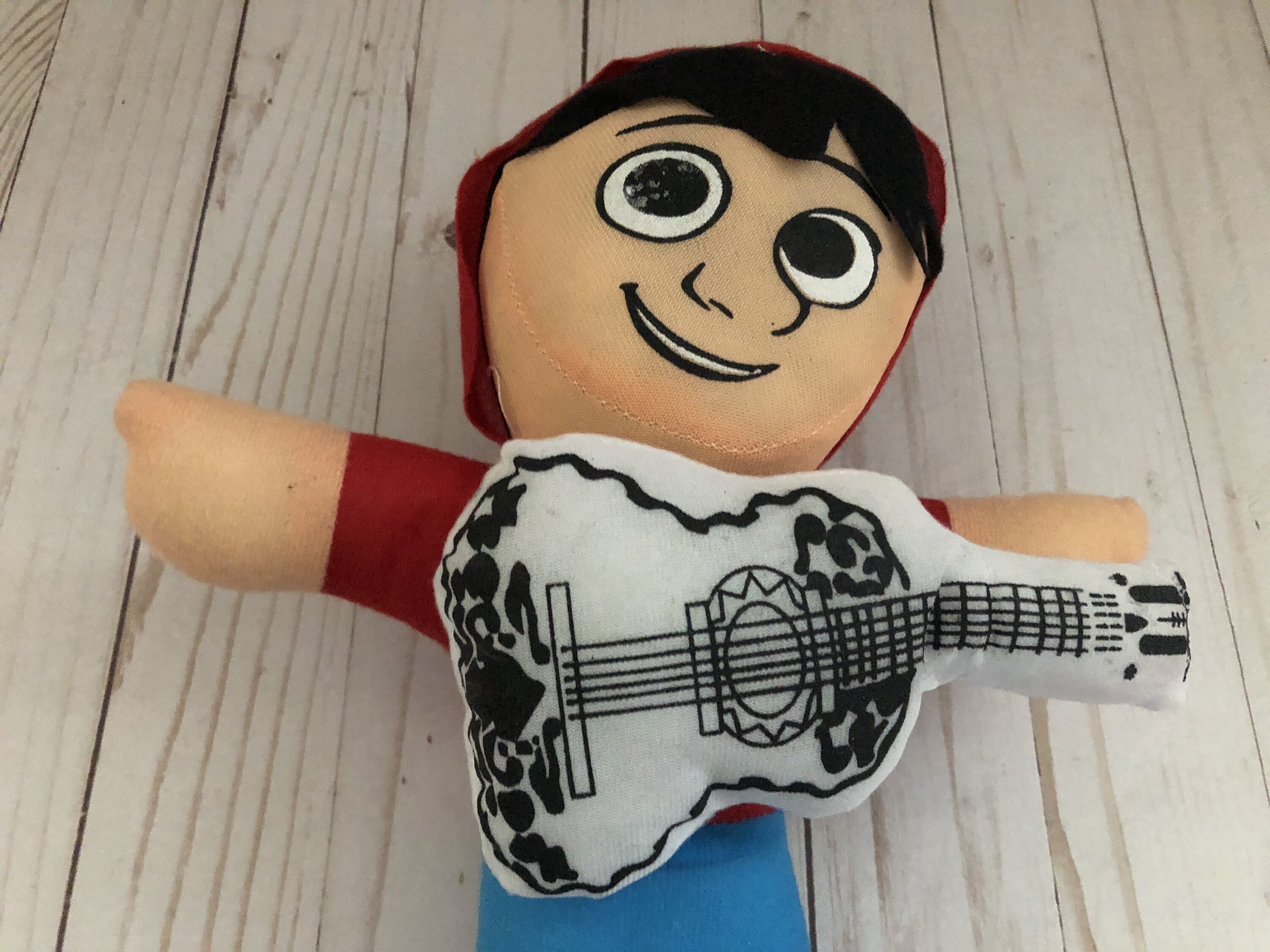 Disney coco miguel plush hotsell