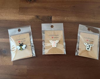 Bee and Cow needle minders