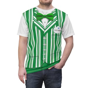 May include: A white t-shirt with a green and white striped vest printed on the front. The vest has a green bow tie and a button-up front. A name tag with the text "CAST MEMBER" is on the left side of the vest.