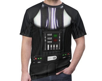 May include: A black t-shirt with a printed image of Darth Vader's chest piece, including the control panel and belt.