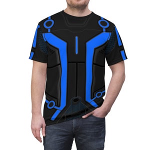 May include: A black t-shirt with a blue and black geometric design. The design features a series of lines and circles that create a futuristic look.