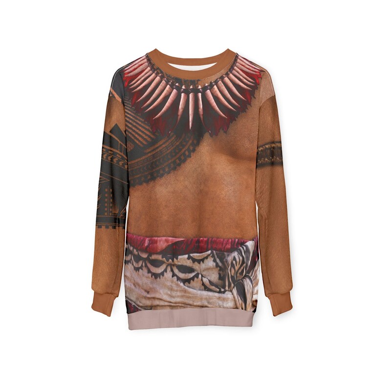 May include: A long-sleeve crewneck sweatshirt featuring a realistic graphic print of a tan-skinned torso with a large tooth necklace, intricate black tribal arm tattoos, and a patterned fabric wrap around the waist in shades of red, white, and brown.