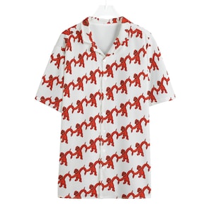 May include: White button-down shirt with a repeating pattern of red figures. The short-sleeved shirt has a classic collar and a button-up front. The red figures appear to be holding hands, creating a unique and eye-catching design.