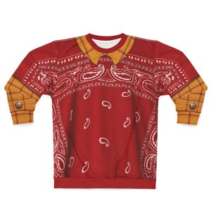 May include: A long-sleeve crewneck sweatshirt featuring a red bandana print with white paisley patterns. The garment includes a printed yellow plaid collar and yellow plaid sleeve cuffs with brown buttons, creating a layered appearance.