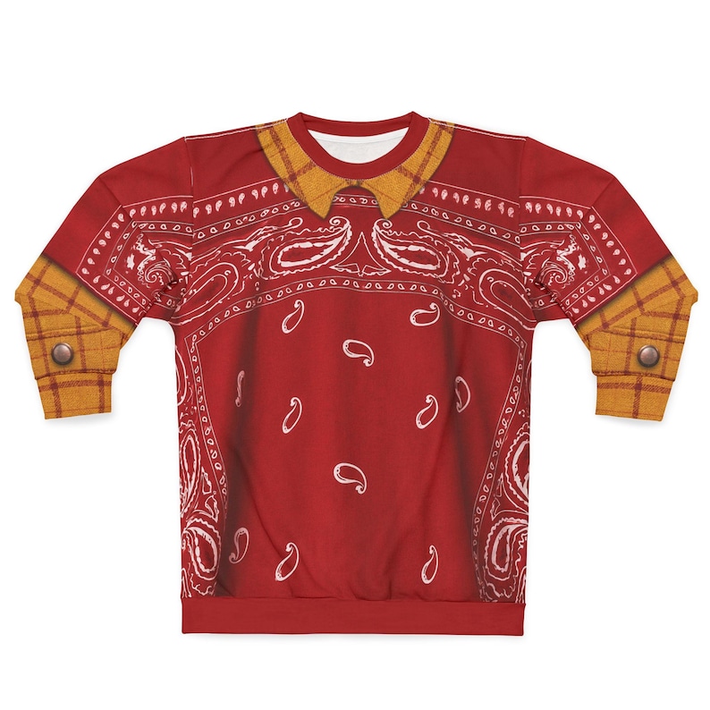 May include: A long-sleeve crewneck sweatshirt featuring a red bandana print with white paisley patterns. The garment includes a printed yellow plaid collar and yellow plaid sleeve cuffs with brown buttons, creating a layered appearance.