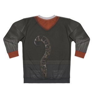 May include: A black sweatshirt with a design that mimics a jacket and jeans. The sweatshirt features a brown tail design and a red hood. The sleeves have a textured gray pattern and red cuffs. The back of the sweatshirt has a pocket design.