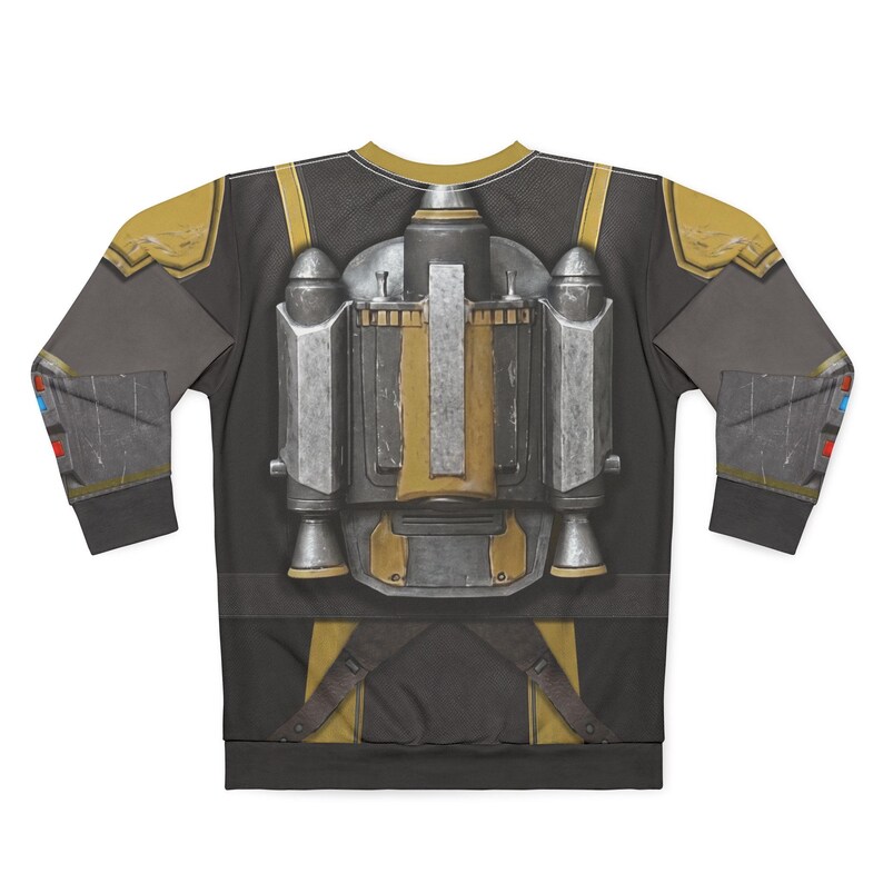 May include: A long-sleeved sweatshirt with a detailed print of a jetpack and armour design. The design incorporates shades of grey, gold, and silver, with a black background. The sleeves have additional armour details and accents of red and blue.