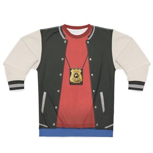 May include: A long-sleeved sweatshirt with a design that mimics a police officer's uniform. The design includes a red shirt, a black and cream-colored letterman jacket, and a gold police badge. The sleeves have black and gray striped cuffs.