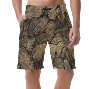 May include: Brown and green swim shorts with a wood grain pattern. The shorts have a drawstring waist and pockets. The shorts are knee-length and made of a lightweight material.