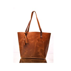 Grote bruine leren draagtas, monogram-werktas