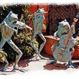 Musical frog trio of human sized copper frog sculpture