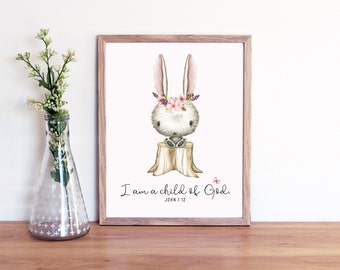 May include: A watercolor illustration of a bunny wearing a flower crown sitting on a tree stump. The text "I am a child of God. John 3:1-12" is below the bunny.