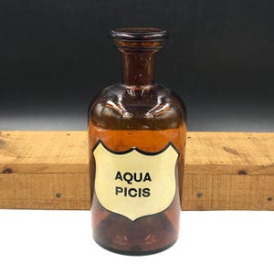 Vintage Amber Glass Apothecary Bottle: AQUA PICIS Label & Ground Stopper