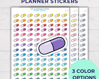 May include: A sheet of planner stickers featuring colorful pill designs. The stickers are arranged in rows and columns, with three different color options: yellow, blue, and green. The text "PILL PLANNER STICKERS" is at the top of the sheet, and the text "ON A MISSION STORE Planner Stickers" is below the stickers.