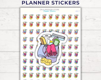 May include: A sheet of 77 cleaning bucket planner stickers. The stickers are white with a colourful cartoon illustration of a cleaning bucket filled with cleaning supplies. The text "ON A MISSION STORE Planner Stickers" and "AN.7" are printed on the sheet.