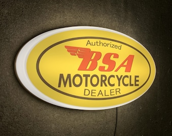 BSA,AUTHORIZED BSA MOTORCYCLE DEALER OVAL METAL SIGN.VINTAGE BSA MOTORCYCLES.