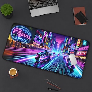 May include: A neon-colored mousepad with a cityscape background and the text "Flynn's Arcade" in a retro font. The cityscape is filled with neon lights and signs in Japanese. There are three futuristic motorcycles racing through the city.