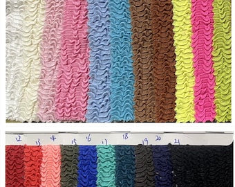 May include: A collection of 21 swatches of 4-way stretch seersucker wave fabric, labeled Item:CX11492, Width:165cm, 250gsm, 93% Polyester, 7% Spandex. The fabric features a textured, rippled surface in a wide variety of colors including white, pink, blue, brown, yellow, green, red, and black.