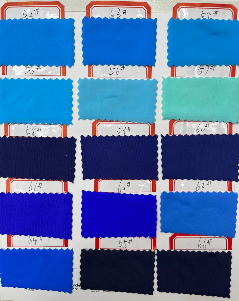 May include: A fabric swatch color chart featuring fifteen rectangular samples with pinked edges, arranged in five rows and three columns. Each swatch is labeled with a number from 52# to 66#, displaying various shades of blue, navy, and teal.