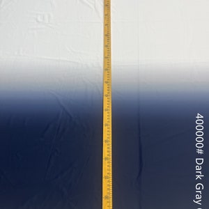 May include: A white to dark gray ombre fabric with a yellow measuring tape along the right side. The tape measures 70 inches. The text "400000# Dark Gray Ombre" is on the right side of the image.