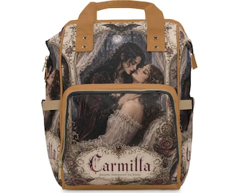 May include: A tan backpack featuring a gothic illustration of two figures in a romantic embrace. The front pocket displays the text "Carmilla" and "Joseph Sheridan Le Fanu" in a decorative font. The design includes ornate frames, roses, and a bat.