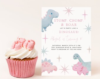 May include: A pink and blue dinosaur-themed birthday party invitation with a white background and silver glitter stars. The text reads "Stomp, Chomp, & Roar. Let's party like a Dinosaur!  Abigail is turning 1!"  The invitation also includes the date, time, and location of the party.