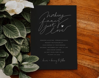 May include: Black wedding invitation with white calligraphy that reads "nothing fancy just love" with a small heart symbol. The invitation includes the names Jennifer Augustine and Edward Peterson, the date and time of the wedding, the location, and the address. The invitation also includes the text "dinner + dancing to follow".