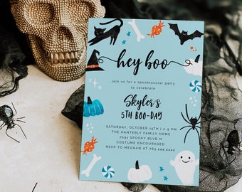 May include: A blue and white Halloween party invitation with the text "hey boo" and "Skyler's 5th Boo-Day". The invitation features a black cat, a witch's hat, a bat, a spider, a ghost, and candy.