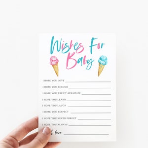 K&ouml;nnte beinhalten: Eine wei&szlig;e Karte mit dem Text "Wishes For Baby" in blauer und rosa Schrift. Zwei Eiswaffeln, eine rosa und eine blaue, befinden sich auf beiden Seiten des Textes. Die Karte enth&auml;lt eine Liste von W&uuml;nschen f&uuml;r ein Baby, wie z. B. "Ich hoffe, du liebst", "Ich hoffe, du wirst", "Ich hoffe, du hast keine Angst vor", "Ich hoffe, du lernst", "Ich hoffe, du lachst", "Ich hoffe, du respektierst", "Ich hoffe, du vergisst nie", "Ich hoffe, du bist immer", und "Ich liebe dich".