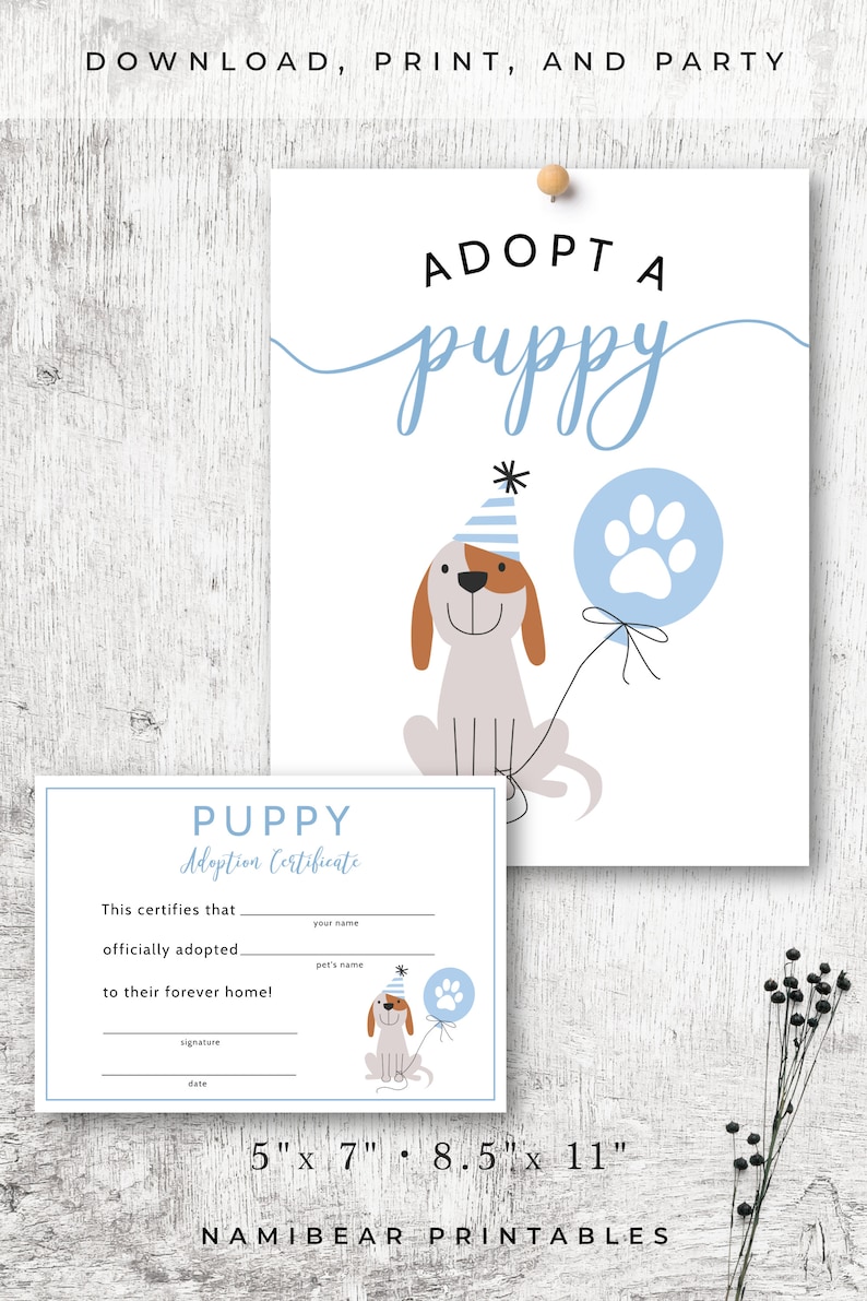 May include: Printable adoption certificate for a puppy. The certificate features a cartoon puppy wearing a party hat and holding a blue balloon with a paw print. The certificate is 5 inches by 7 inches or 8.5 inches by 11 inches.