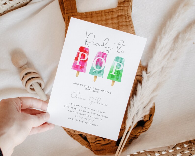 May include: A baby shower invitation with a watercolor illustration of three popsicles spelling out "POP". The invitation is for Olivia Sullivan and includes the date, time, and location of the shower. RSVP information and registry details are also included.