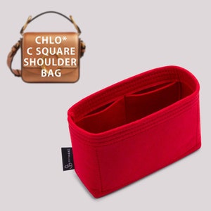 May include: Red felt bag insert for a Chloe C Square Shoulder Bag. The insert has multiple compartments and is designed to help organize the bag.