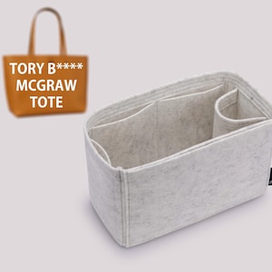 Puede incluir: Un organizador de bolso de fieltro blanco con múltiples compartimentos y un logotipo de Joyinbag. El organizador está diseñado para caber dentro de un bolso Tory Burch McGraw Tote.