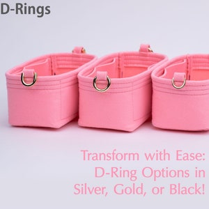 May include: Three pink felt bags with gold D-rings. Transform with Ease: D-Ring Options in Silver, Gold, or Black!